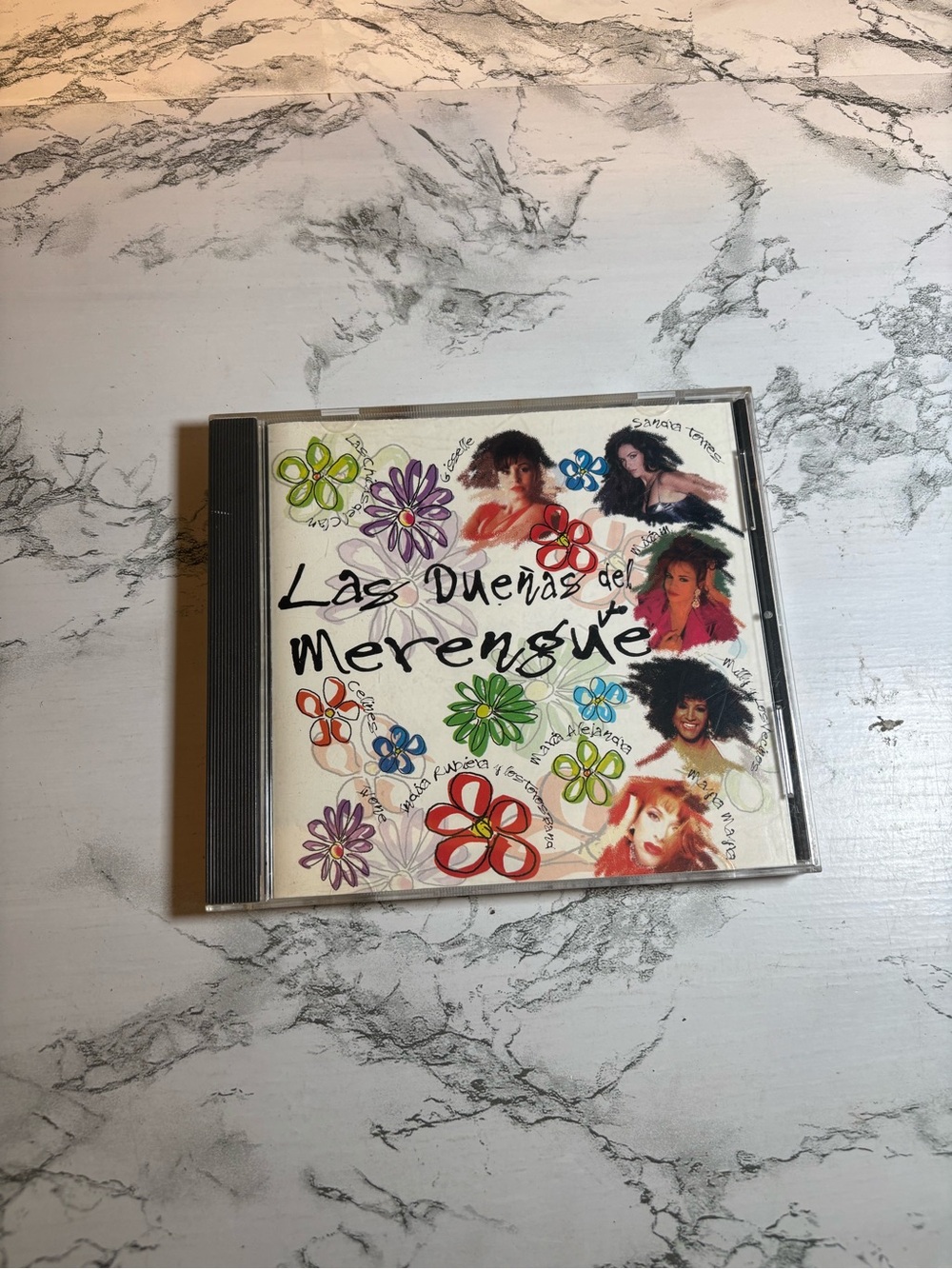 Las Dueñas del Merengue CD — Colorful Floral Cover